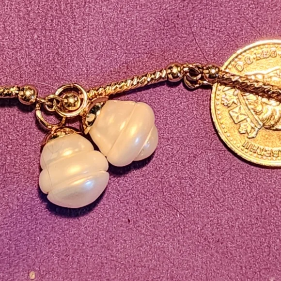 Queen Elizabeth part 2 gold bracelet